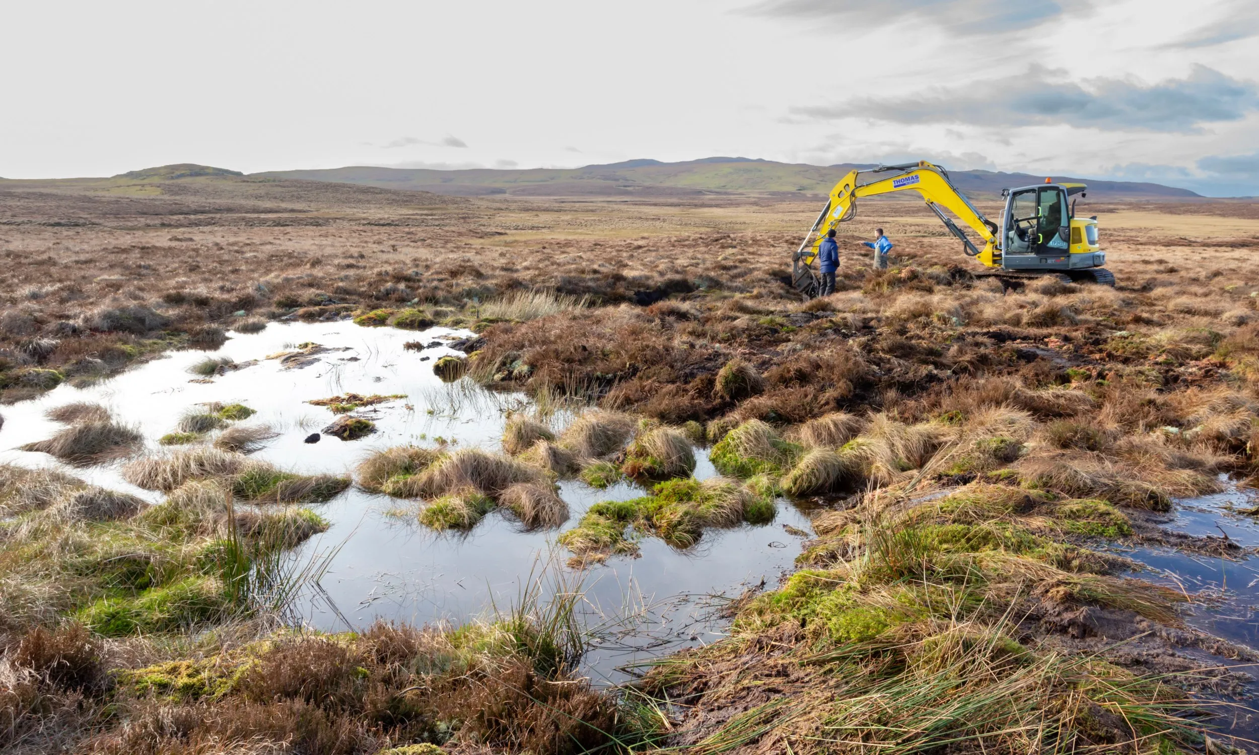 Diggers to carrying out peatland restoration work for RSPB peatland restoration project