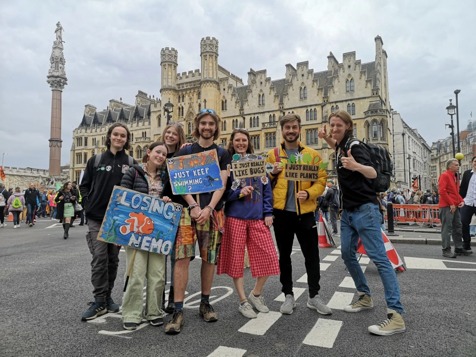 The Youth Council holding hand painted signs at a protest.
